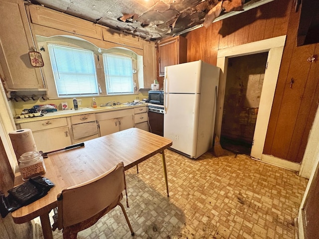 kitchen featuring sink and black appliances