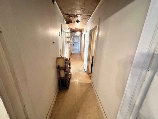 hallway with light wood-type flooring