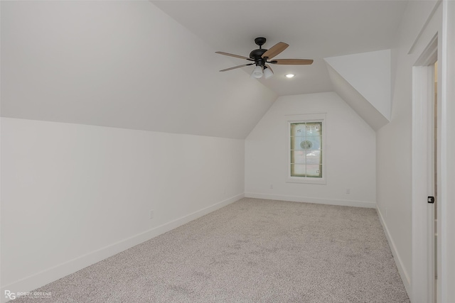 bonus room featuring light carpet, vaulted ceiling, and ceiling fan