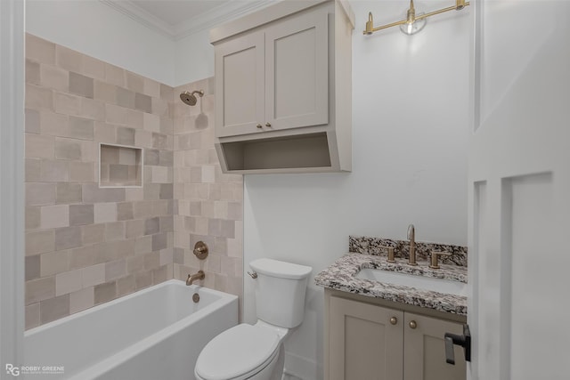 full bathroom with tiled shower / bath combo, vanity, toilet, and crown molding