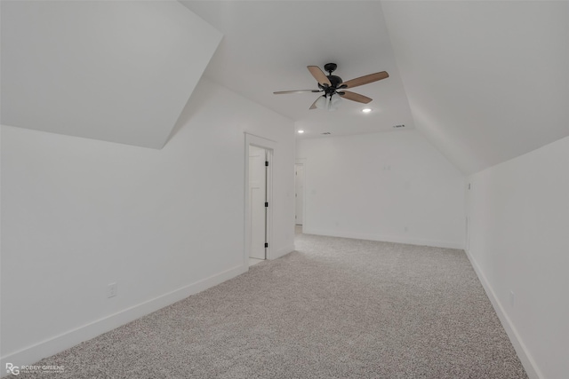 bonus room featuring ceiling fan, carpet floors, and lofted ceiling