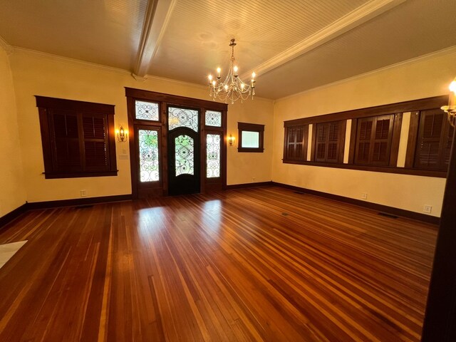 interior space featuring an inviting chandelier, beam ceiling, and dark wood-type flooring