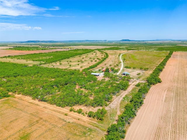 birds eye view of property featuring a rural view