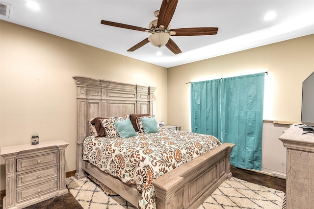 carpeted bedroom featuring ceiling fan