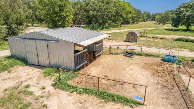 view of outbuilding featuring a rural view