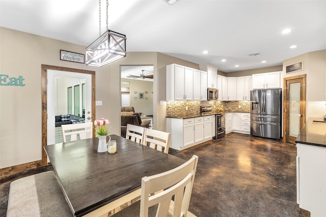 dining area with ceiling fan