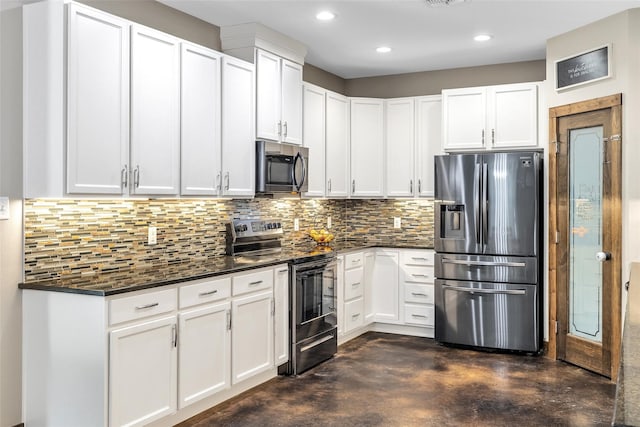 kitchen with white cabinets, decorative backsplash, and appliances with stainless steel finishes