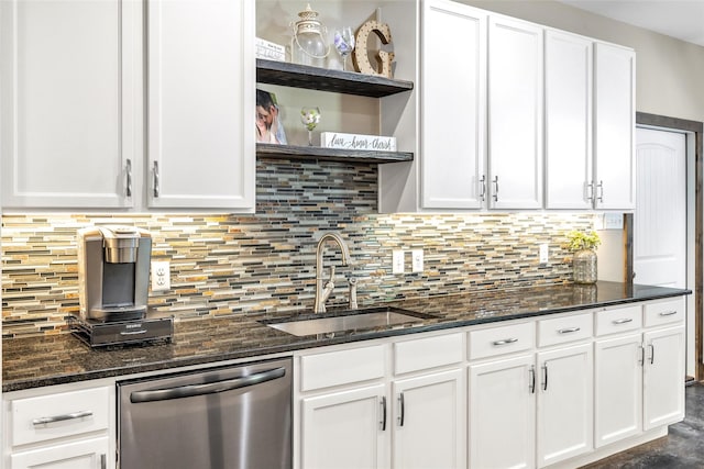 kitchen featuring sink, white cabinets, backsplash, and dishwasher