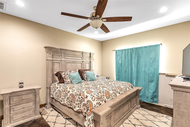 carpeted bedroom with ceiling fan