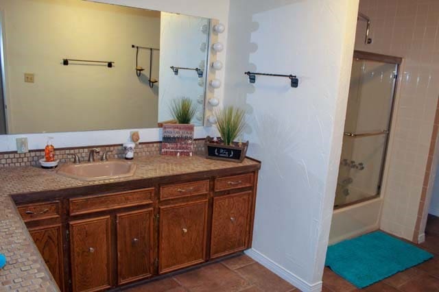 full bathroom with shower / bathing tub combination and vanity