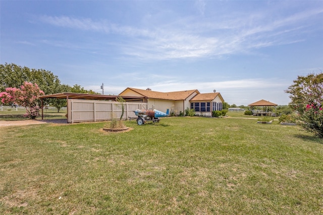 view of yard with a fire pit