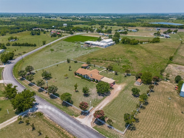 birds eye view of property featuring a rural view