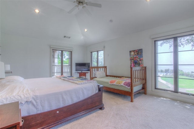 bedroom with carpet, ceiling fan, and lofted ceiling