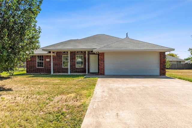 single story home with a front lawn and a garage