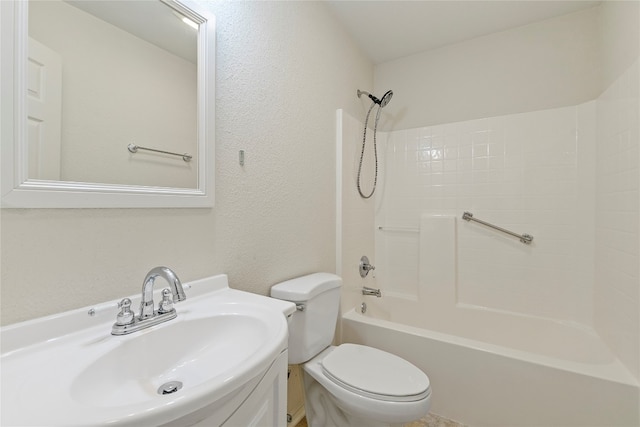 full bathroom with toilet, large vanity, and bathtub / shower combination