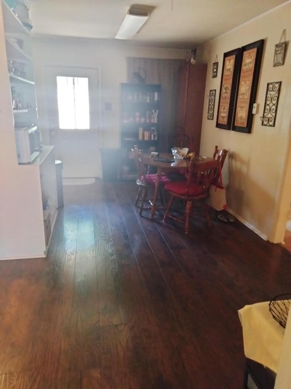 dining room featuring dark hardwood / wood-style flooring