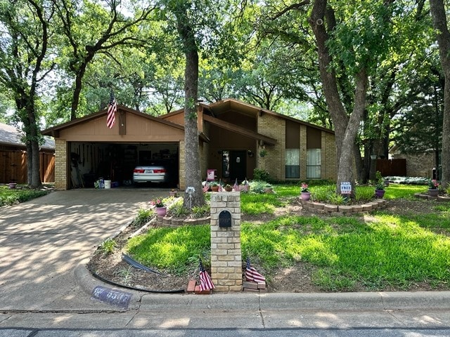 ranch-style home with a garage