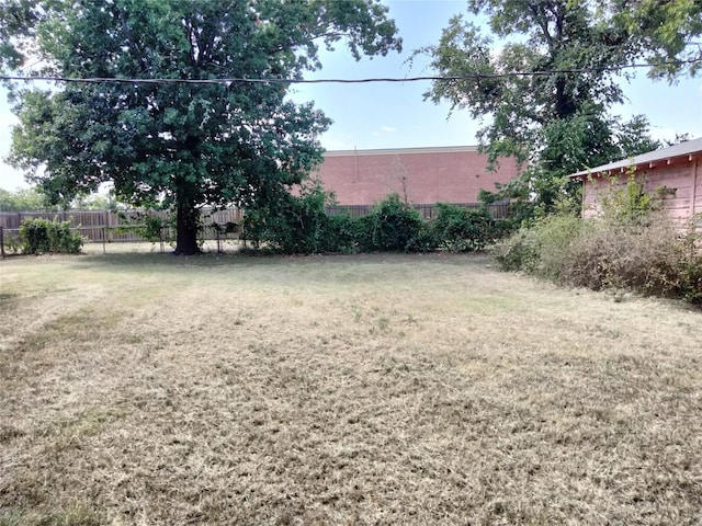 view of yard featuring fence