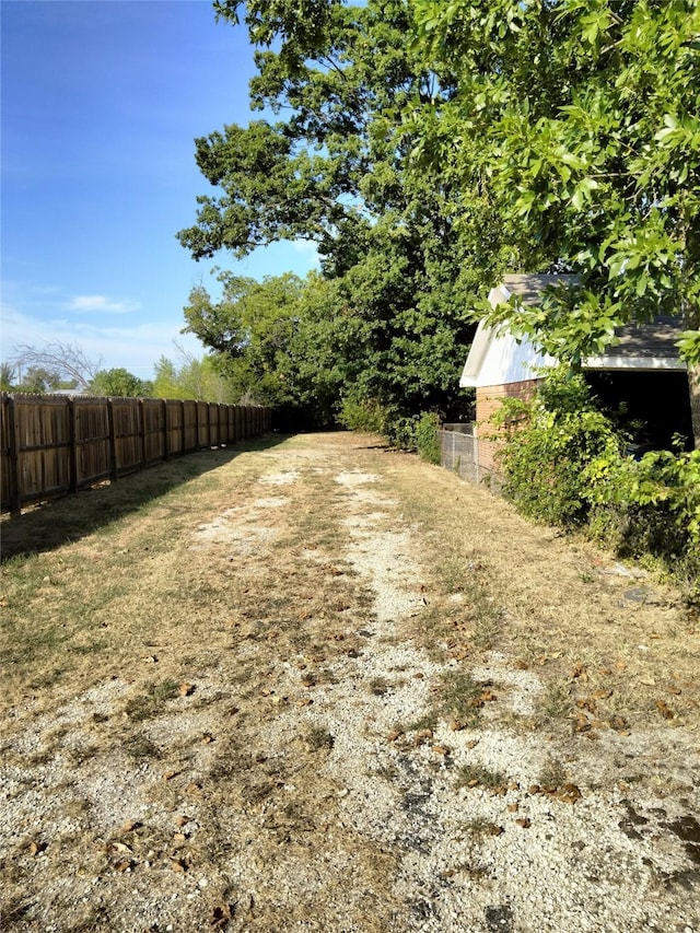 view of yard with fence