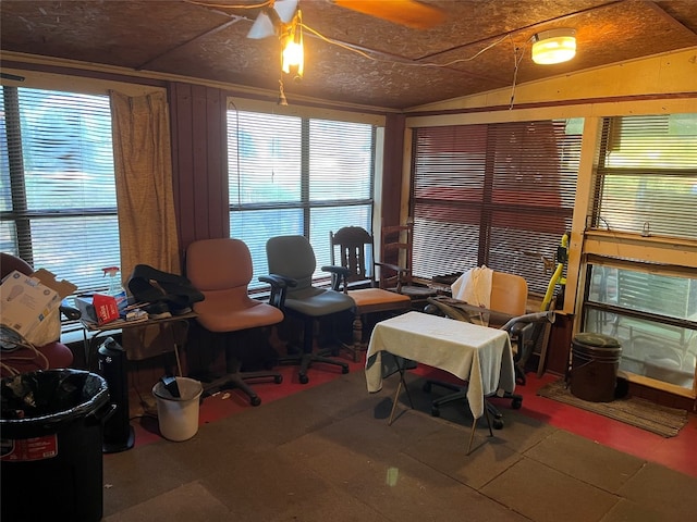 office space with ceiling fan, a wealth of natural light, and lofted ceiling