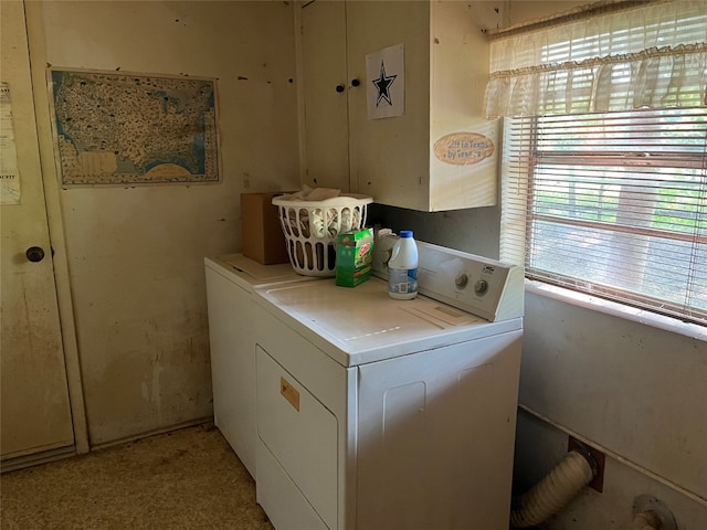 clothes washing area with independent washer and dryer