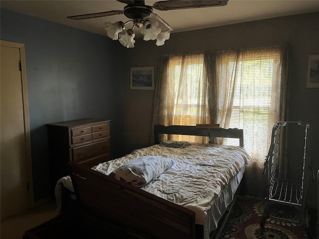 bedroom featuring ceiling fan