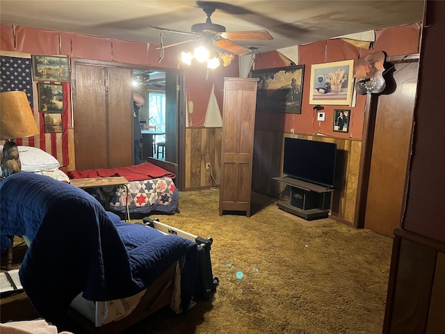 bedroom with ceiling fan and carpet floors