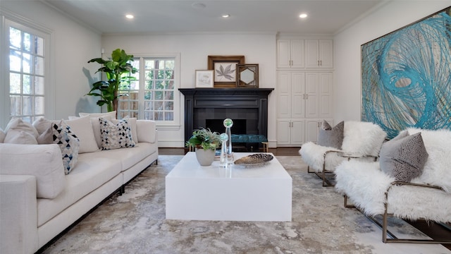 living room featuring crown molding and light wood-type flooring