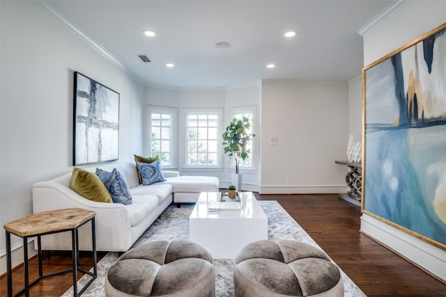 living room with crown molding and dark hardwood / wood-style floors