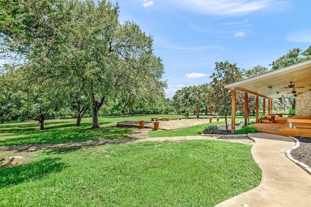 view of yard featuring ceiling fan