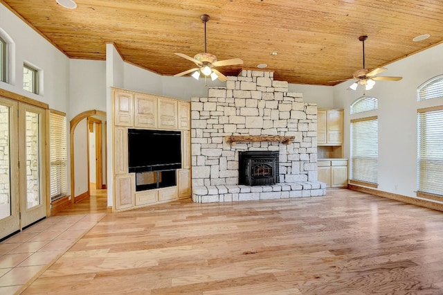 unfurnished living room featuring wooden ceiling, ceiling fan, and light wood-type flooring