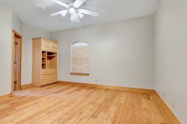 unfurnished bedroom featuring ceiling fan and light hardwood / wood-style flooring