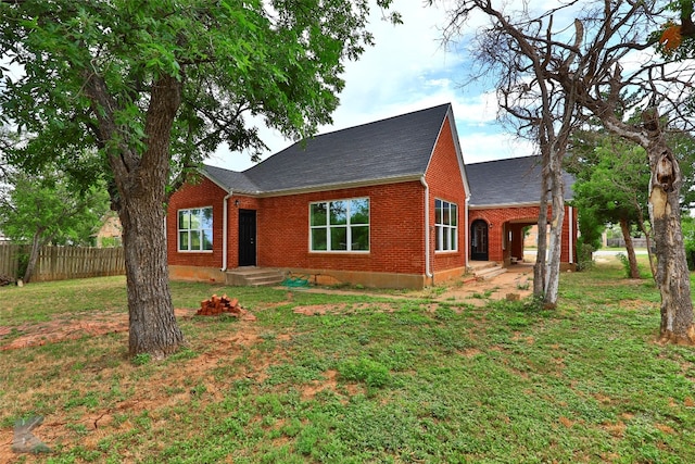 view of front of home with a front lawn