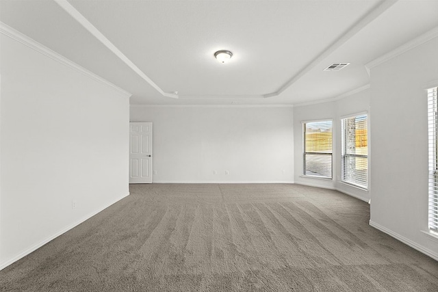 unfurnished room with dark colored carpet and crown molding