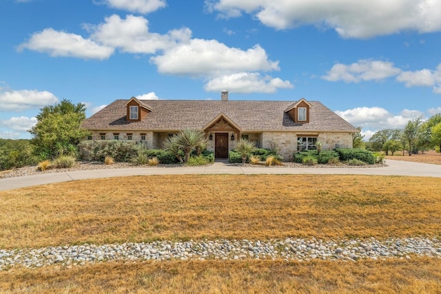 view of front of house with a front yard