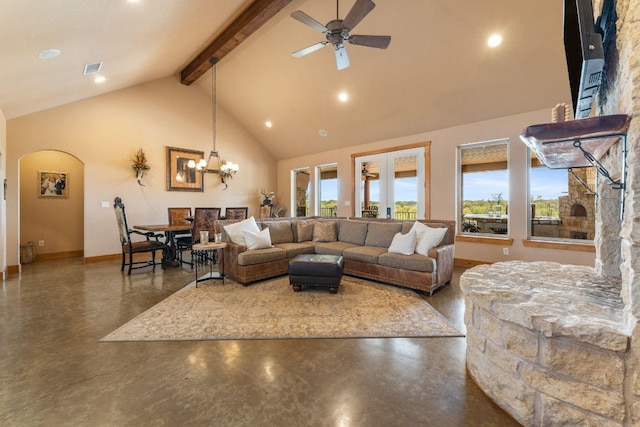 living room with beam ceiling, plenty of natural light, high vaulted ceiling, and ceiling fan with notable chandelier