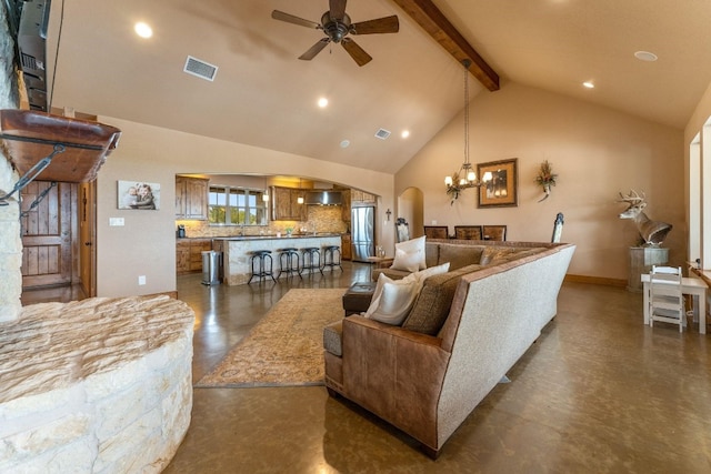 living room with beam ceiling, high vaulted ceiling, and ceiling fan with notable chandelier