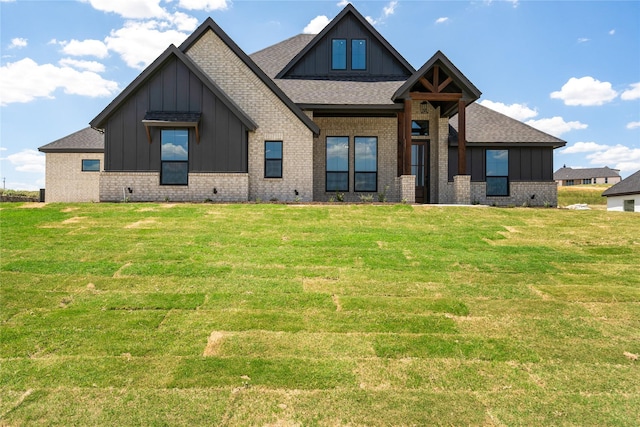 view of front of property with a front lawn