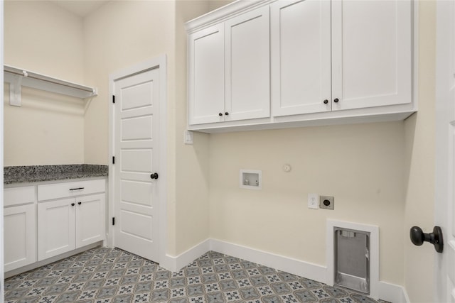 washroom with hookup for an electric dryer, hookup for a washing machine, hookup for a gas dryer, and cabinets