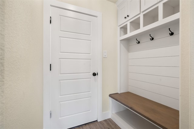 mudroom with hardwood / wood-style floors