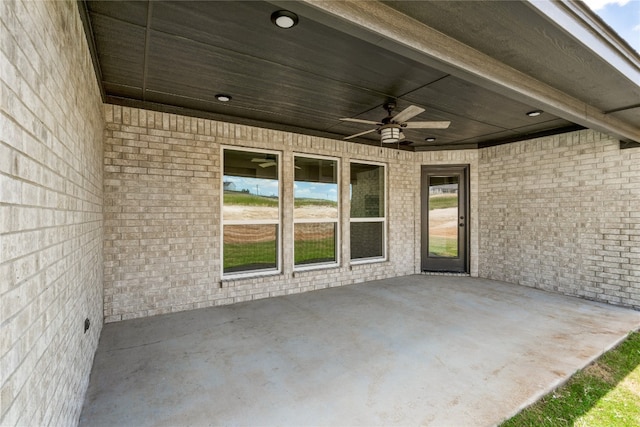 view of patio / terrace featuring ceiling fan