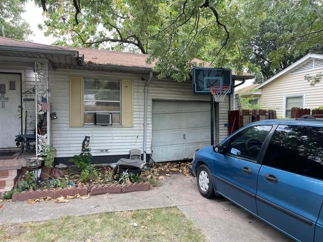 view of property exterior featuring a garage