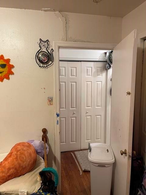 bathroom featuring toilet and hardwood / wood-style floors