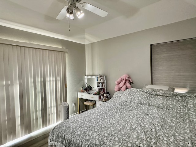 bedroom featuring ceiling fan