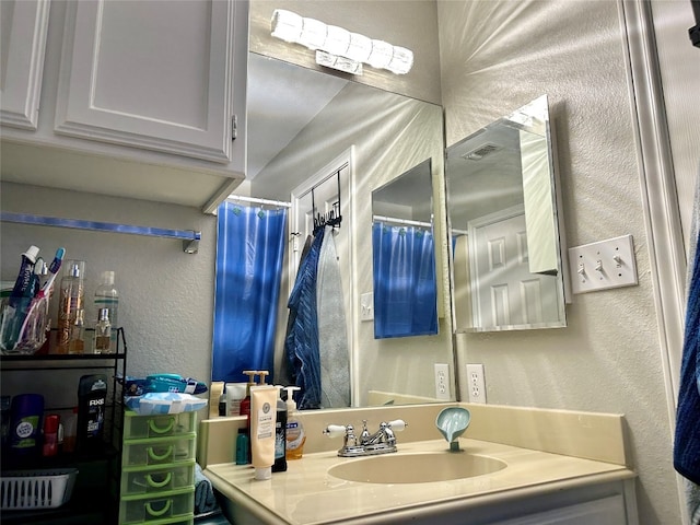 bathroom with oversized vanity