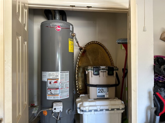 utility room with water heater