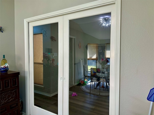 exterior space with french doors and dark hardwood / wood-style floors