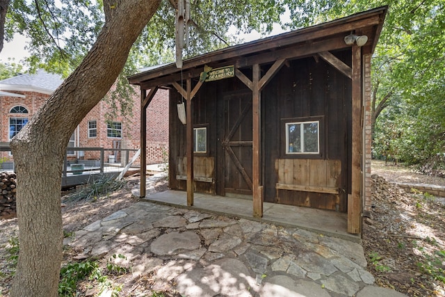 view of patio / terrace with a storage unit