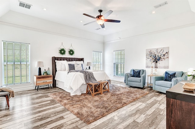 bedroom with hardwood / wood-style floors and ceiling fan