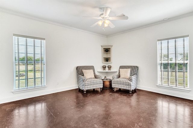 sitting room with crown molding, plenty of natural light, and ceiling fan